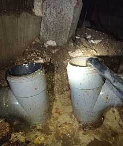 Évacuation avec siphon dans vide sanitaire